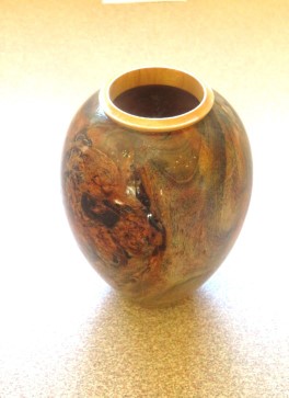 This burr vase won a turning of the month certificate for Howard Overton 